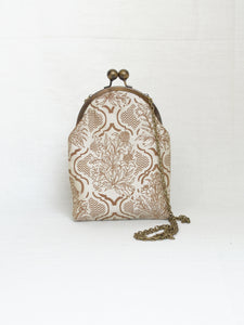 Jahanara Ivory Sling Purse with Antique Finish Metal Clasp and Chain