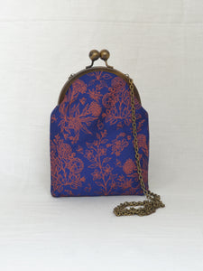 Nishat Blue Sling Purse with Antique Finish Metal Clasp and Chain