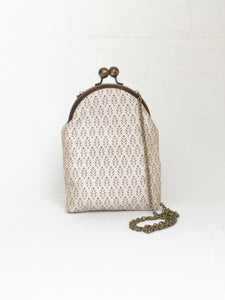 Padmini Ivory Sling Purse with Antique Finish Metal Clasp and Chain